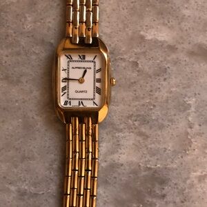 Vintage Alfred Sung Gold Quartz Watch